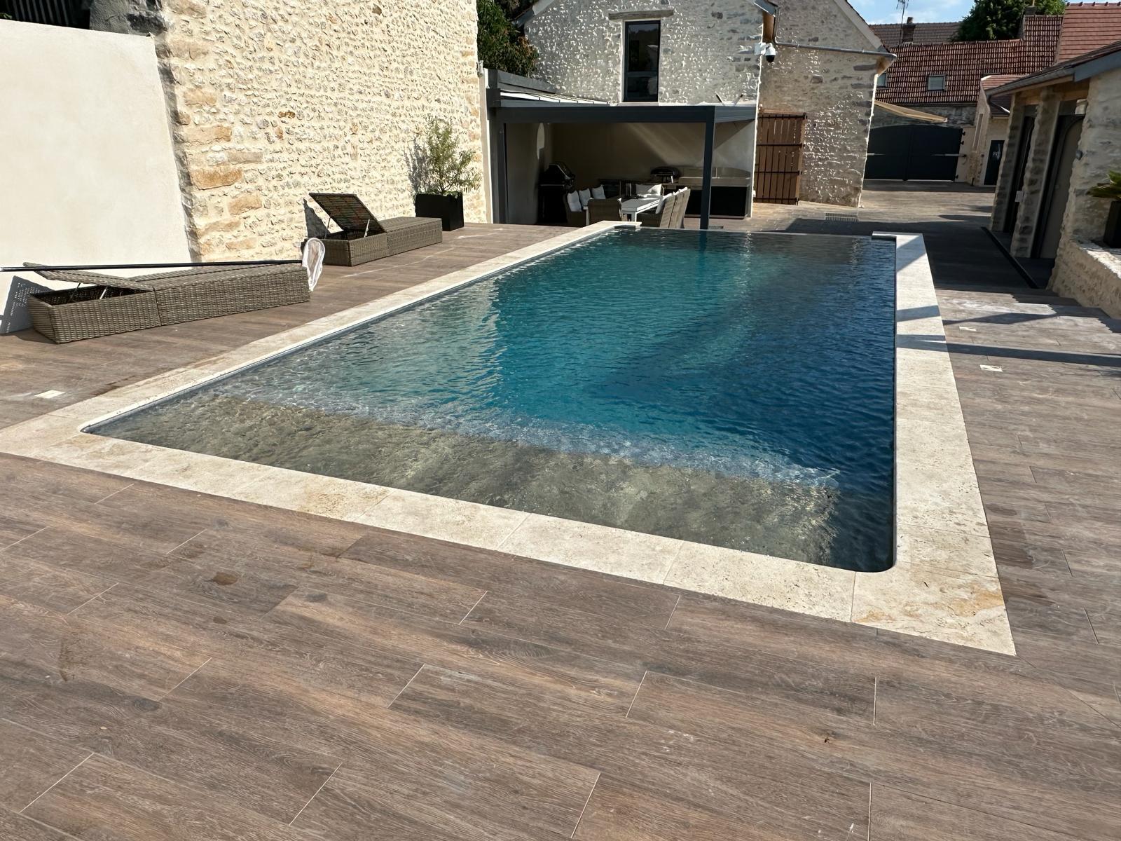 Piscine à Débordement en Béton Armé | Unibéo Piscines